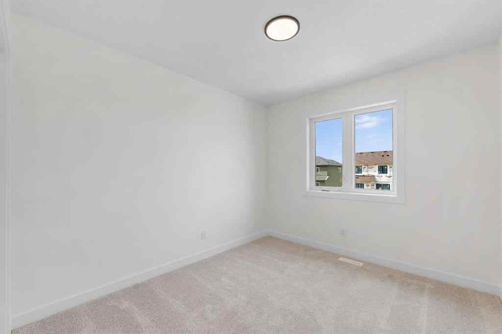 MLS® A2263338 - 437 Hotchkiss Drive SE in Hotchkiss Calgary, Residential