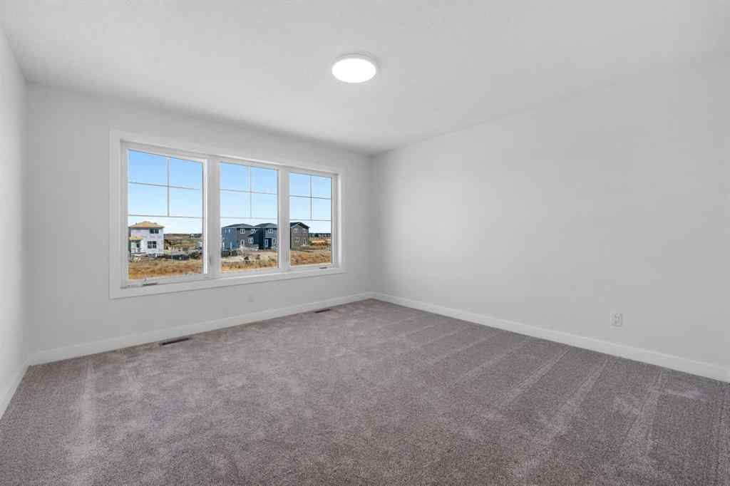 MLS® A2263343 - 477 Hotchkiss Drive SE in Hotchkiss Calgary, Residential