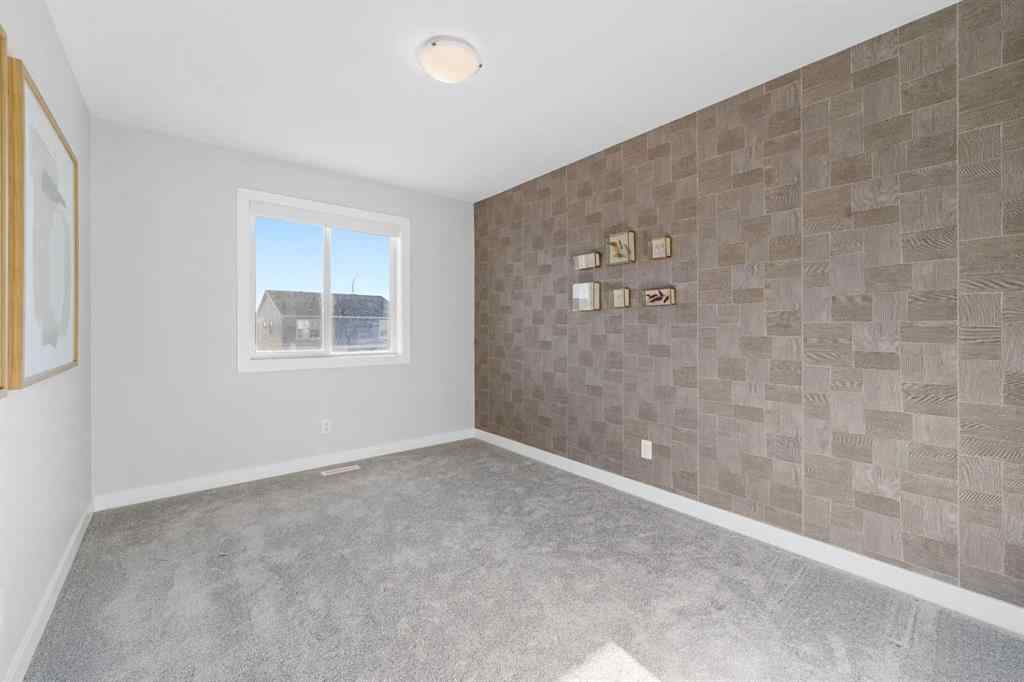 MLS® A2263344 - 129 Hotchkiss Way SE in Hotchkiss Calgary, Residential