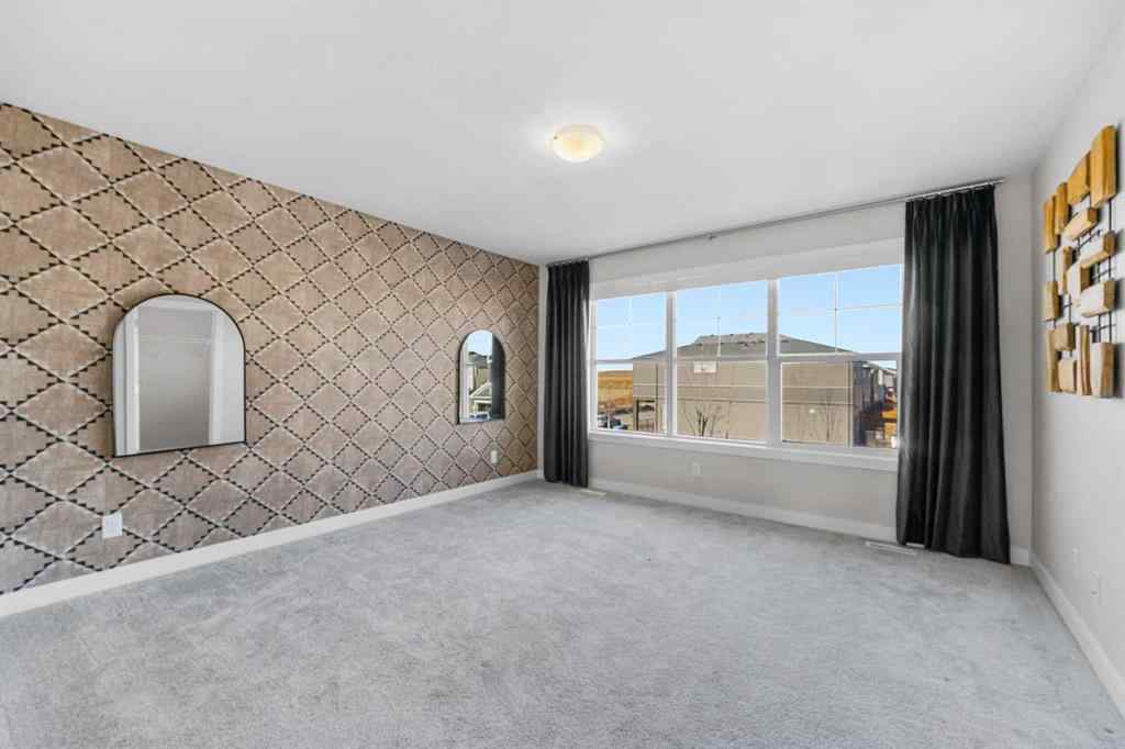 MLS® A2263344 - 129 Hotchkiss Way SE in Hotchkiss Calgary, Residential