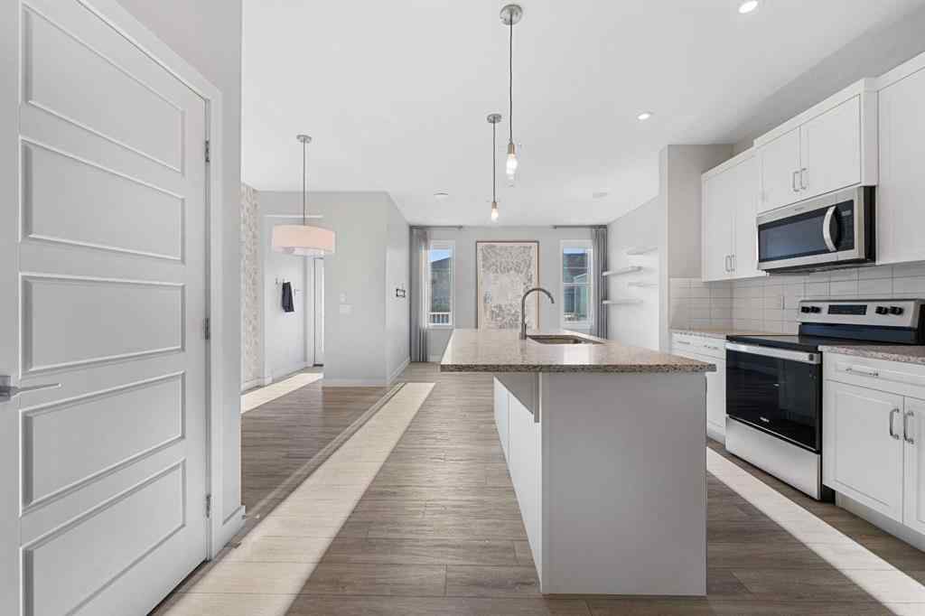 MLS® A2263344 - 129 Hotchkiss Way SE in Hotchkiss Calgary, Residential