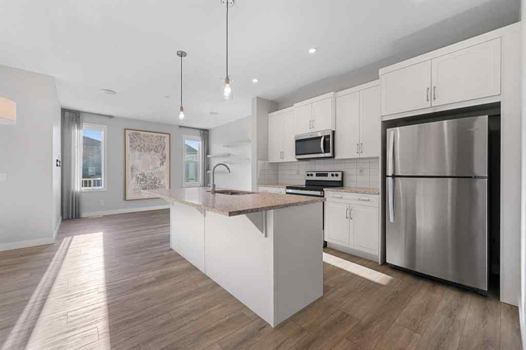 MLS® A2263344 - 129 Hotchkiss Way SE in Hotchkiss Calgary, Residential