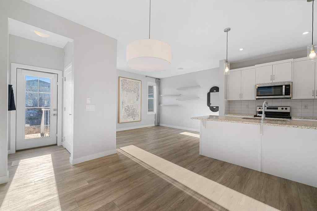 MLS® A2263344 - 129 Hotchkiss Way SE in Hotchkiss Calgary, Residential