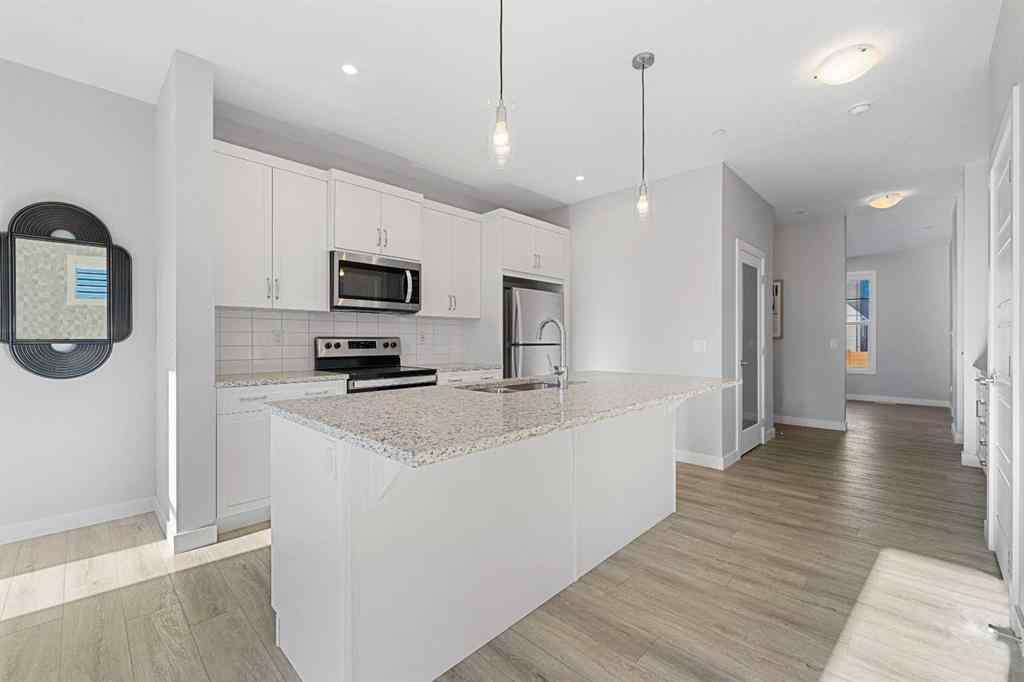 MLS® A2263344 - 129 Hotchkiss Way SE in Hotchkiss Calgary, Residential