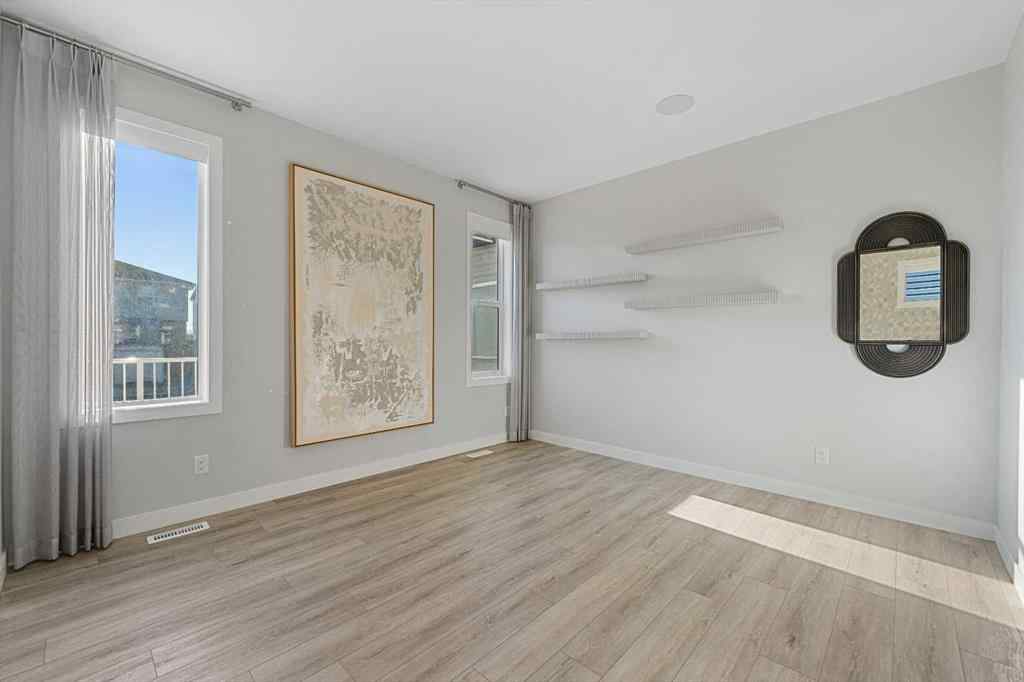 MLS® A2263344 - 129 Hotchkiss Way SE in Hotchkiss Calgary, Residential