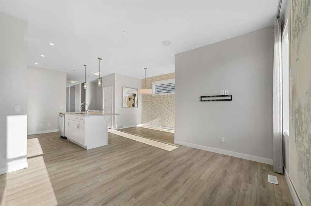 MLS® A2263344 - 129 Hotchkiss Way SE in Hotchkiss Calgary, Residential