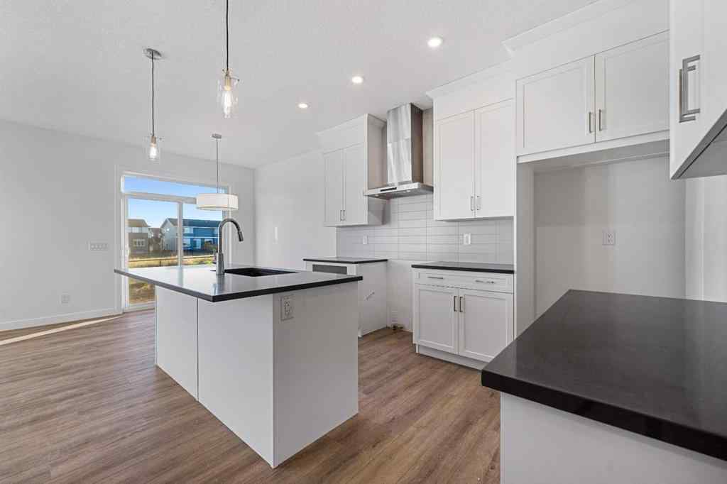 MLS® A2263348 - 229 Dawson Wharf Road  in Dawson\'s Landing Chestermere, Residential