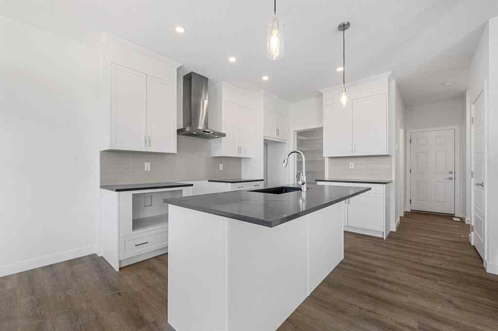 MLS® A2263348 - 229 Dawson Wharf Road  in Dawson\'s Landing Chestermere, Residential