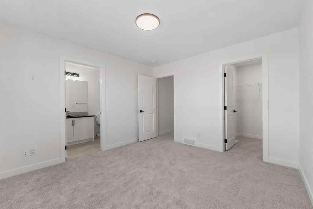 MLS® A2263349 - 97 Ambleton Boulevard NW in Moraine Calgary, Residential