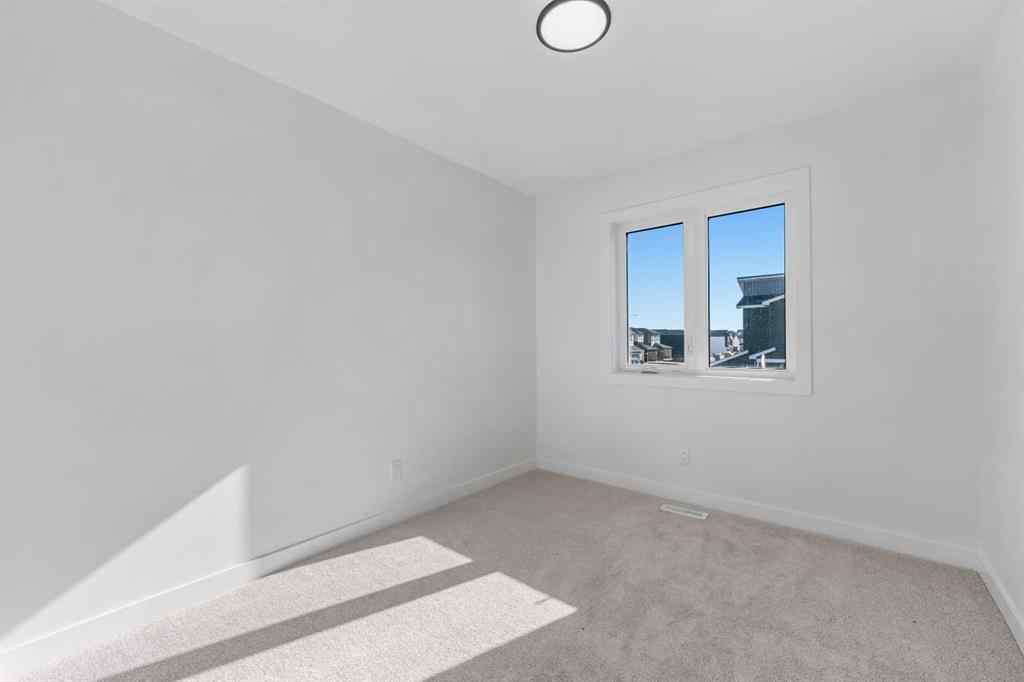 MLS® A2263349 - 97 Ambleton Boulevard NW in Moraine Calgary, Residential