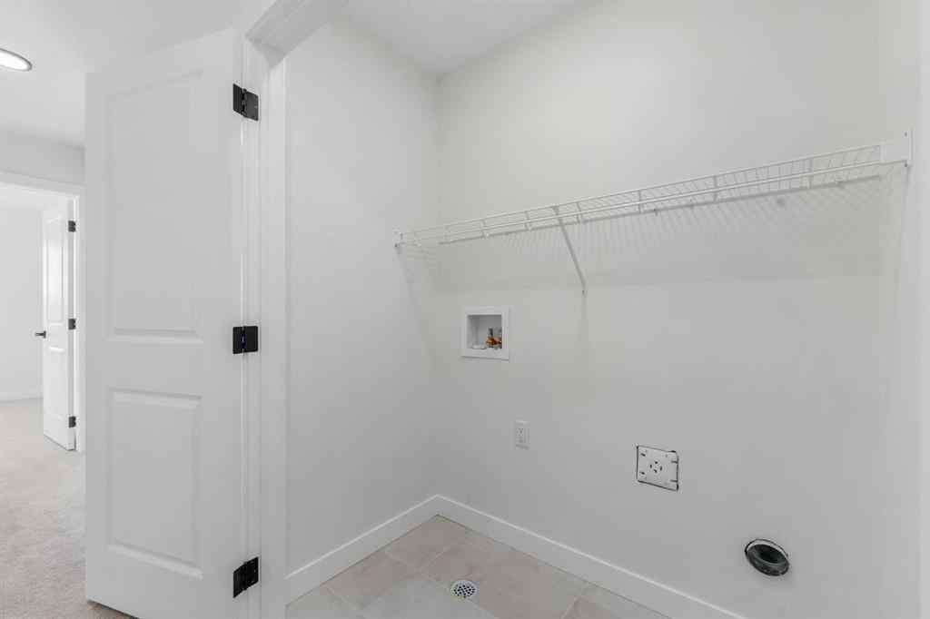 MLS® A2263349 - 97 Ambleton Boulevard NW in Moraine Calgary, Residential