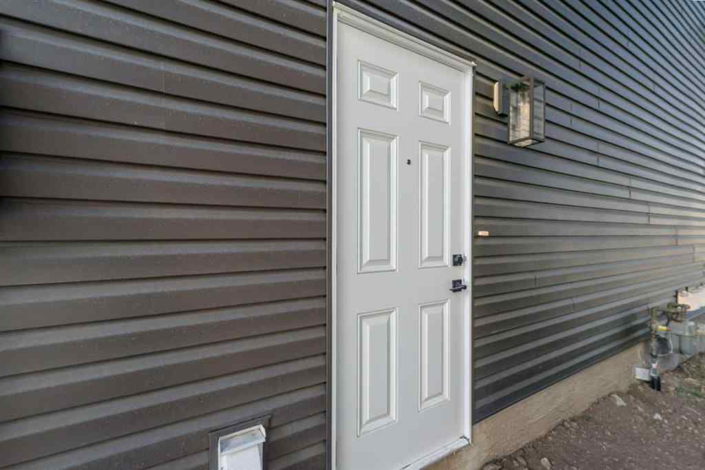 MLS® A2263349 - 97 Ambleton Boulevard NW in Moraine Calgary, Residential