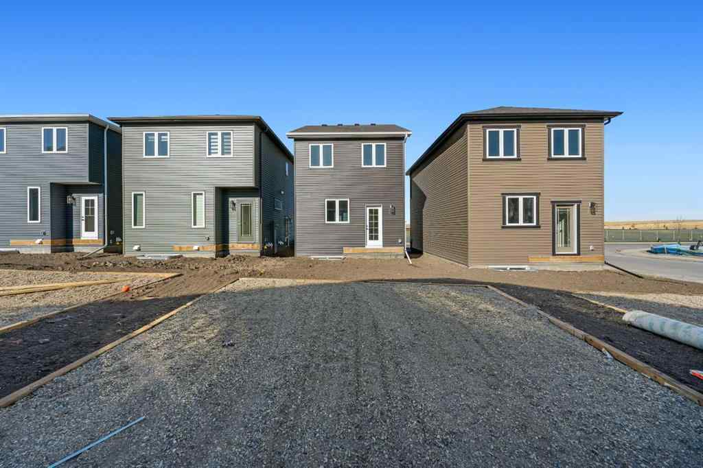 MLS® A2263349 - 97 Ambleton Boulevard NW in Moraine Calgary, Residential