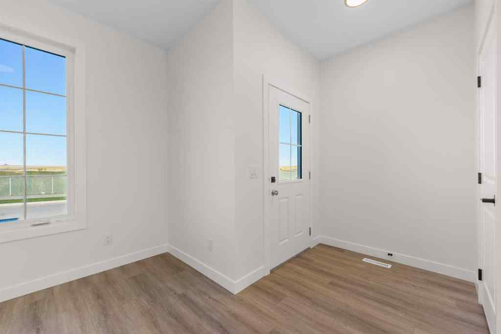 MLS® A2263349 - 97 Ambleton Boulevard NW in Moraine Calgary, Residential