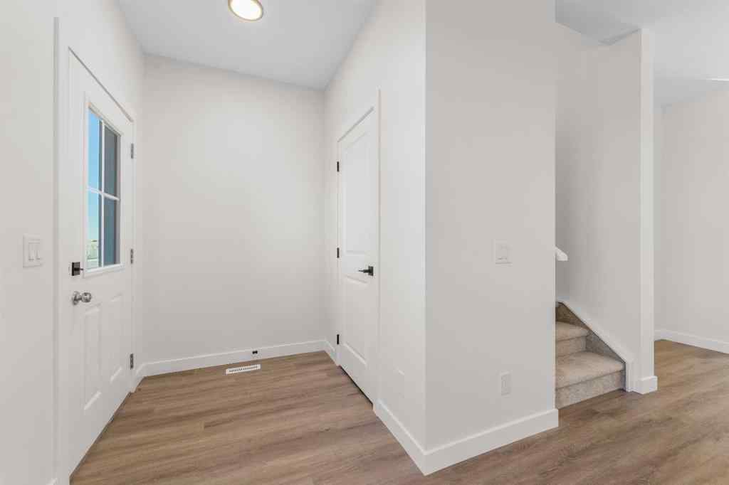 MLS® A2263349 - 97 Ambleton Boulevard NW in Moraine Calgary, Residential