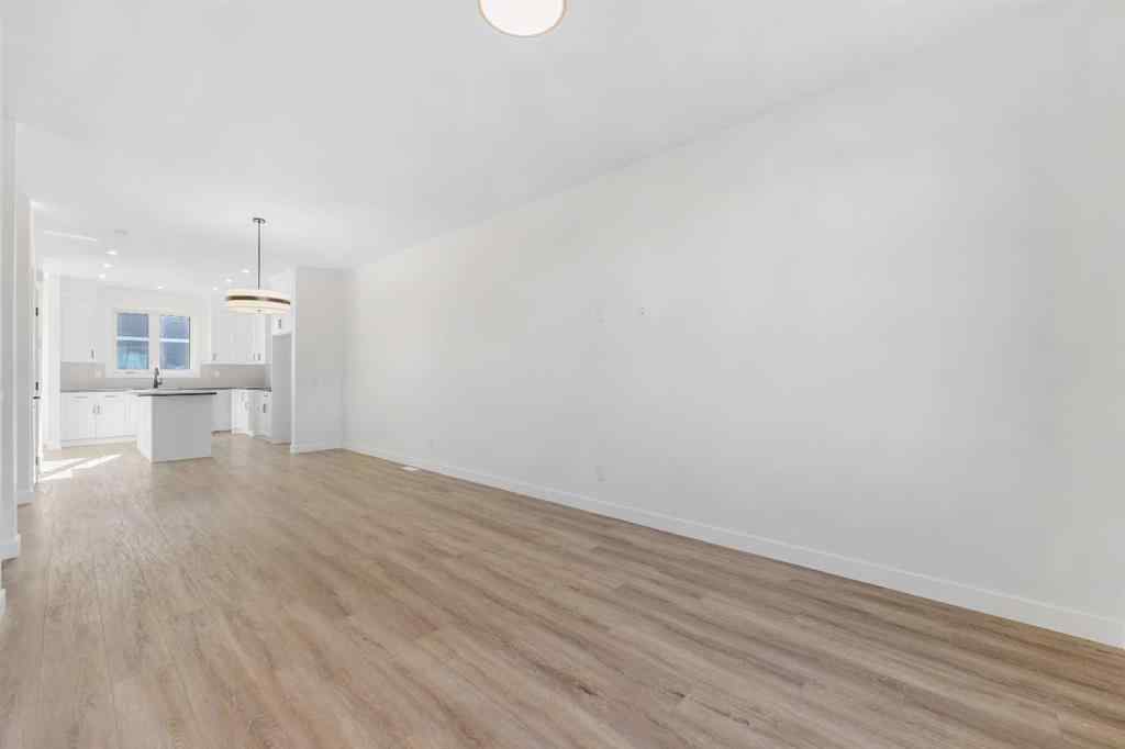 MLS® A2263349 - 97 Ambleton Boulevard NW in Moraine Calgary, Residential