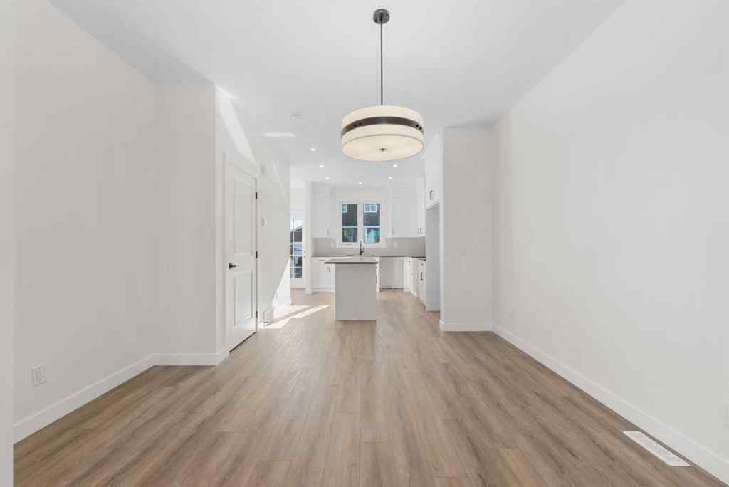 MLS® A2263349 - 97 Ambleton Boulevard NW in Moraine Calgary, Residential