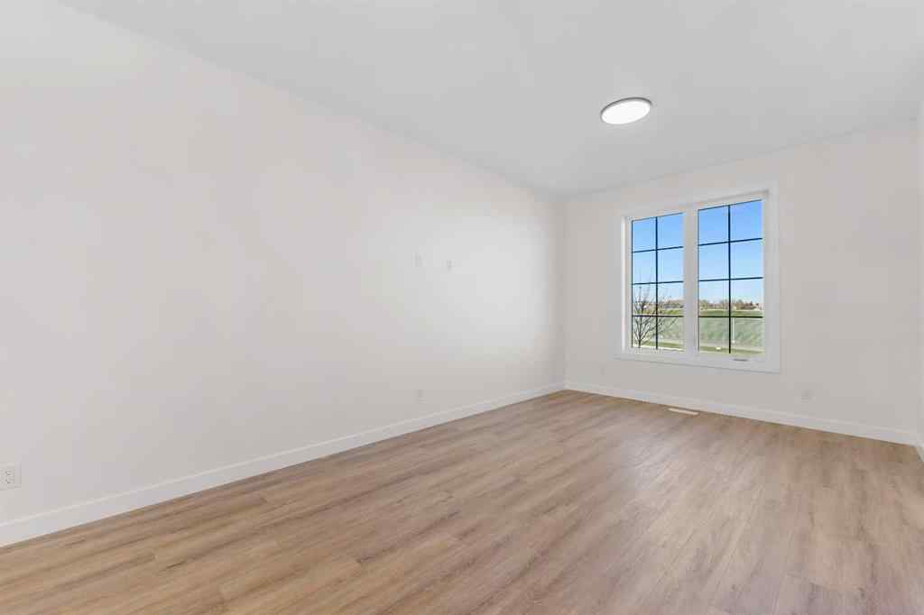 MLS® A2263349 - 97 Ambleton Boulevard NW in Moraine Calgary, Residential