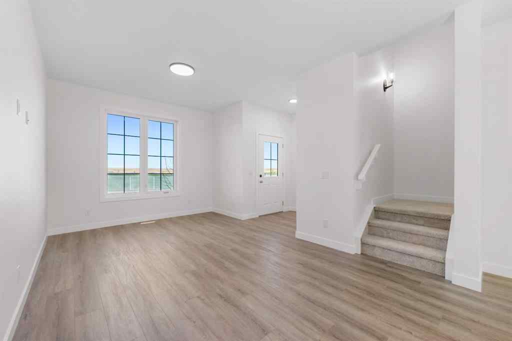 MLS® A2263349 - 97 Ambleton Boulevard NW in Moraine Calgary, Residential