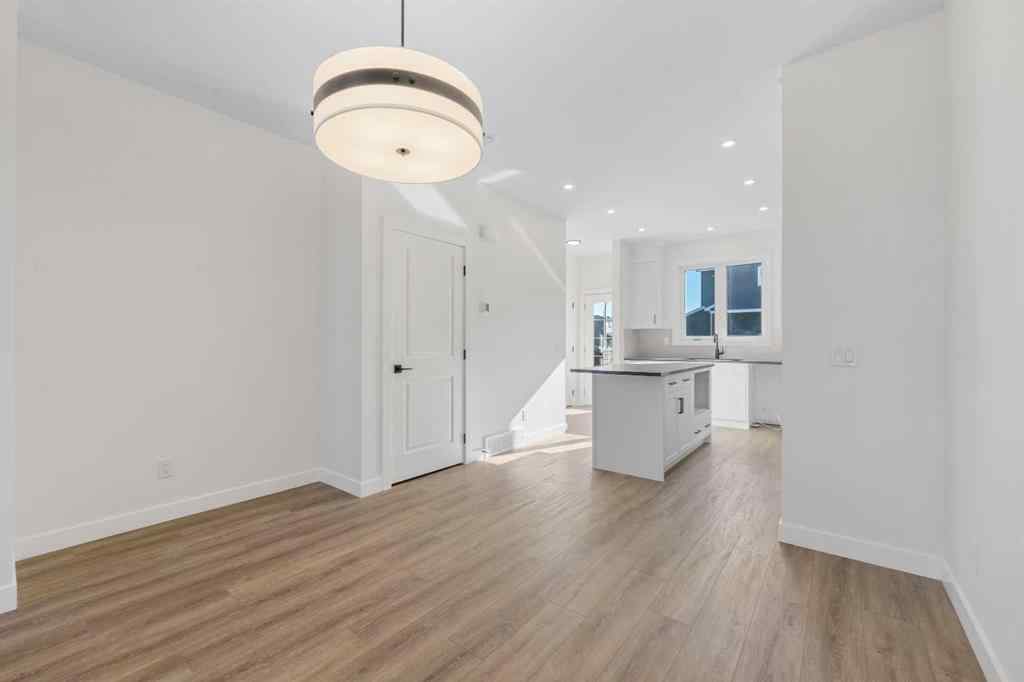 MLS® A2263349 - 97 Ambleton Boulevard NW in Moraine Calgary, Residential