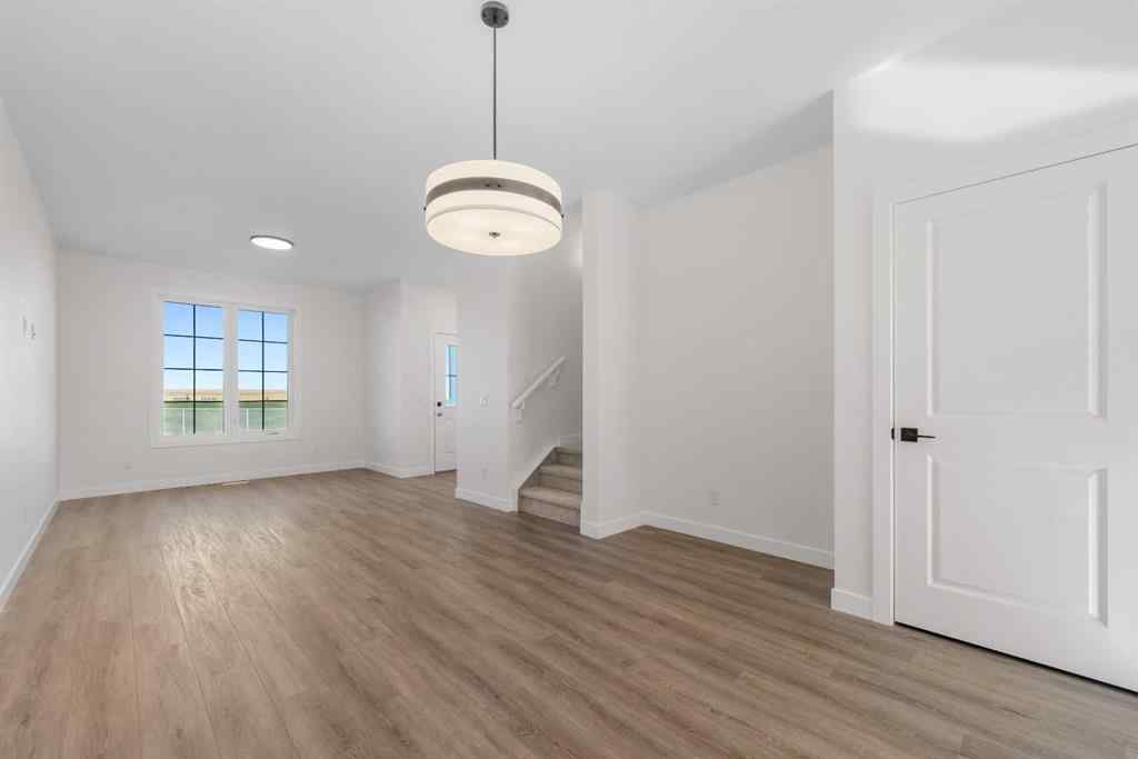 MLS® A2263349 - 97 Ambleton Boulevard NW in Moraine Calgary, Residential