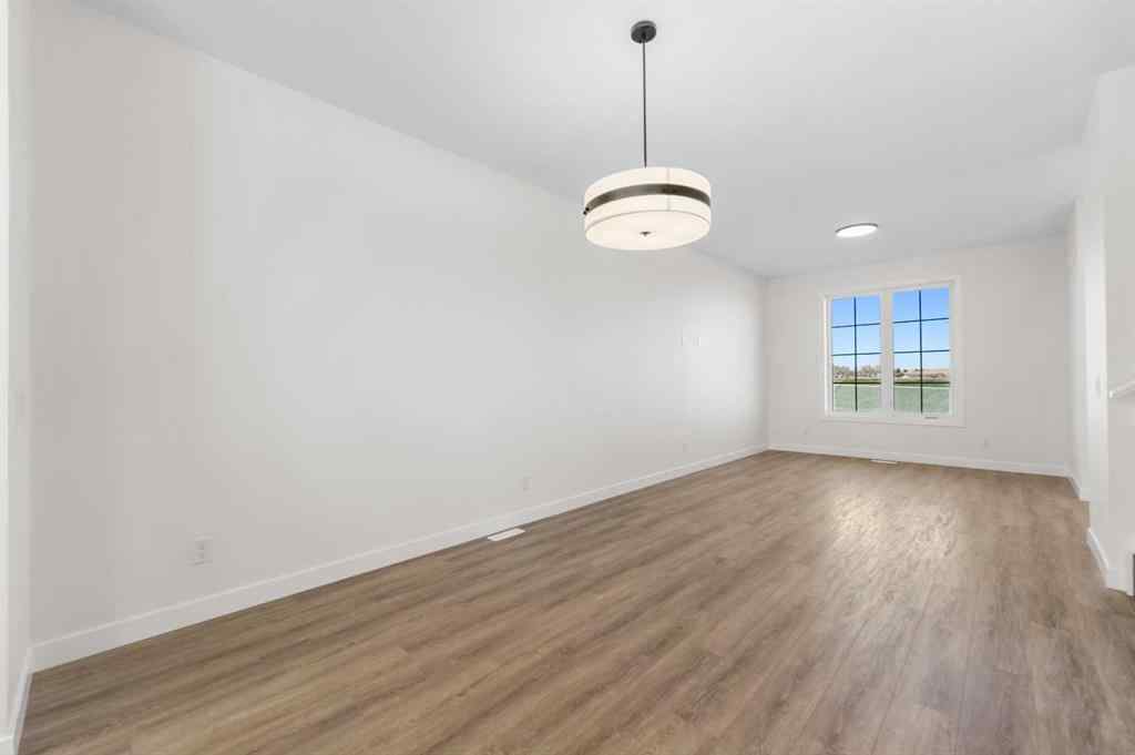 MLS® A2263349 - 97 Ambleton Boulevard NW in Moraine Calgary, Residential