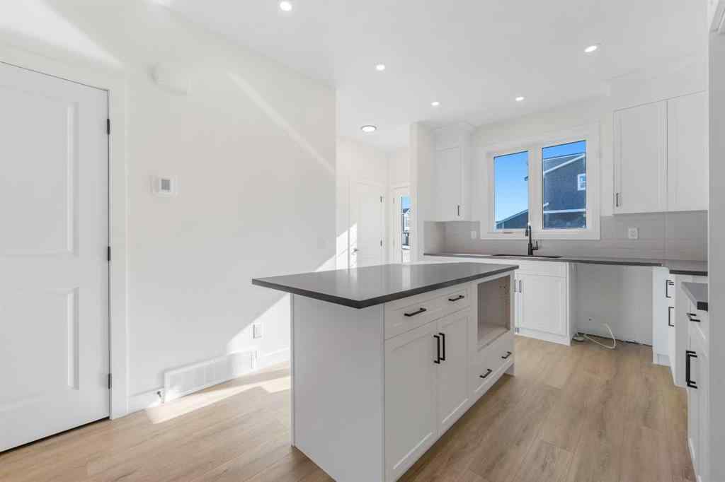 MLS® A2263349 - 97 Ambleton Boulevard NW in Moraine Calgary, Residential