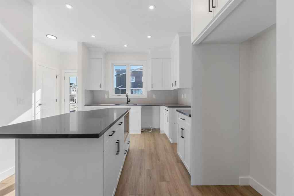 MLS® A2263349 - 97 Ambleton Boulevard NW in Moraine Calgary, Residential