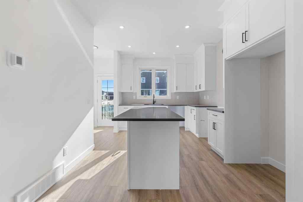 MLS® A2263349 - 97 Ambleton Boulevard NW in Moraine Calgary, Residential