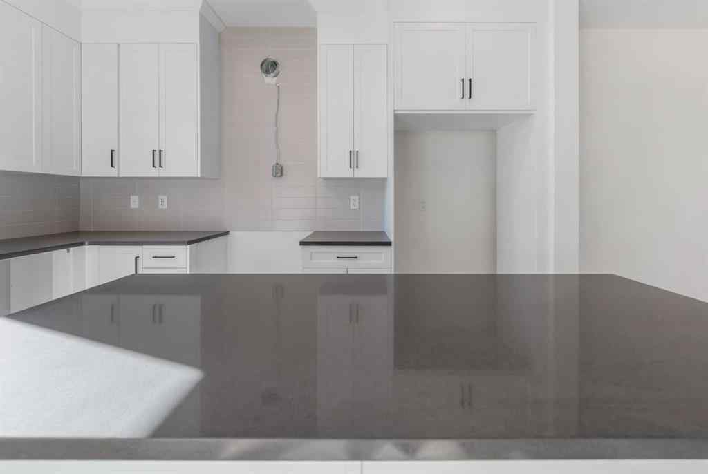 MLS® A2263349 - 97 Ambleton Boulevard NW in Moraine Calgary, Residential