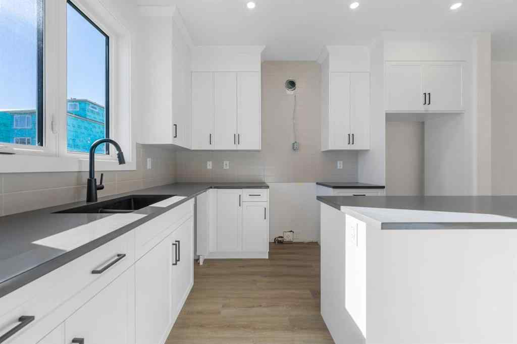 MLS® A2263349 - 97 Ambleton Boulevard NW in Moraine Calgary, Residential