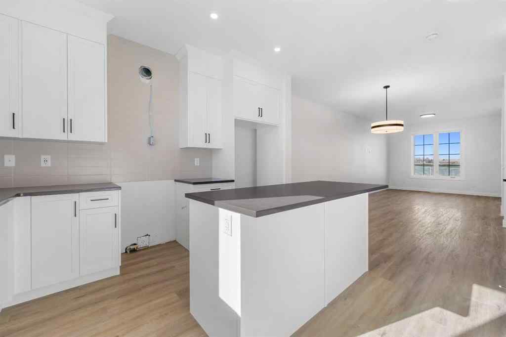 MLS® A2263349 - 97 Ambleton Boulevard NW in Moraine Calgary, Residential