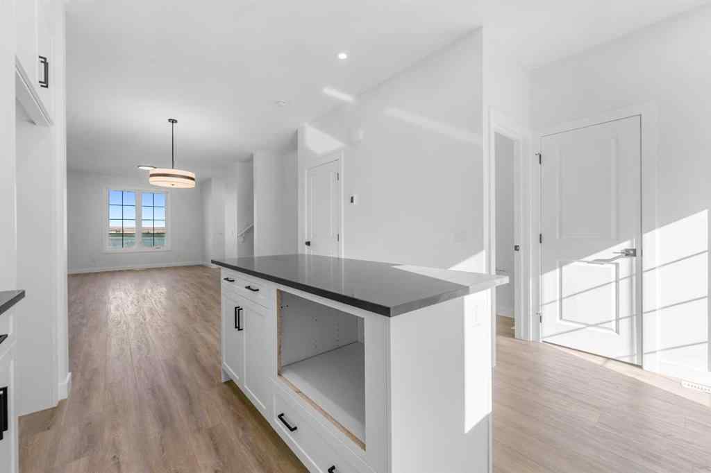 MLS® A2263349 - 97 Ambleton Boulevard NW in Moraine Calgary, Residential