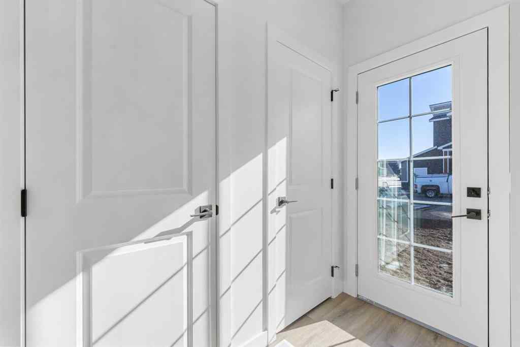 MLS® A2263349 - 97 Ambleton Boulevard NW in Moraine Calgary, Residential