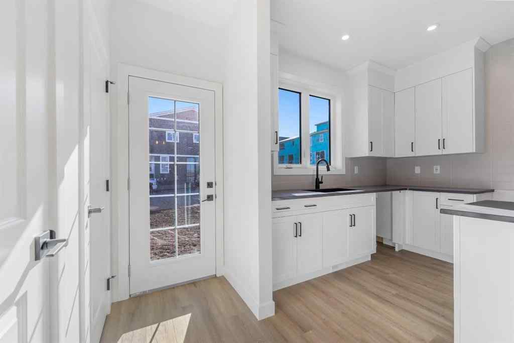 MLS® A2263349 - 97 Ambleton Boulevard NW in Moraine Calgary, Residential