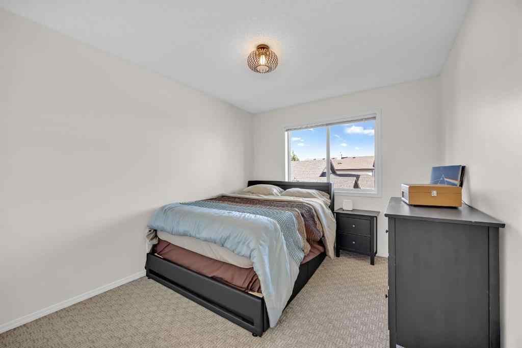 MLS® A2263355 - 104 Stonemere Place  in Westmere Chestermere, Residential