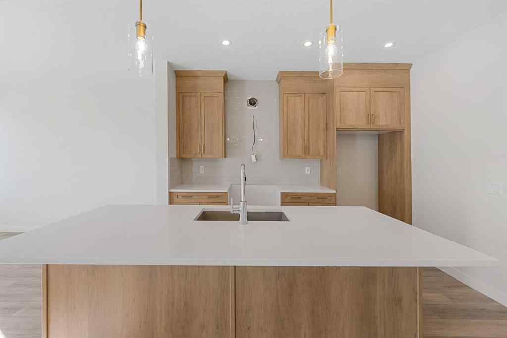 MLS® A2263359 - 125 Ambleton Boulevard NW in Moraine Calgary, Residential