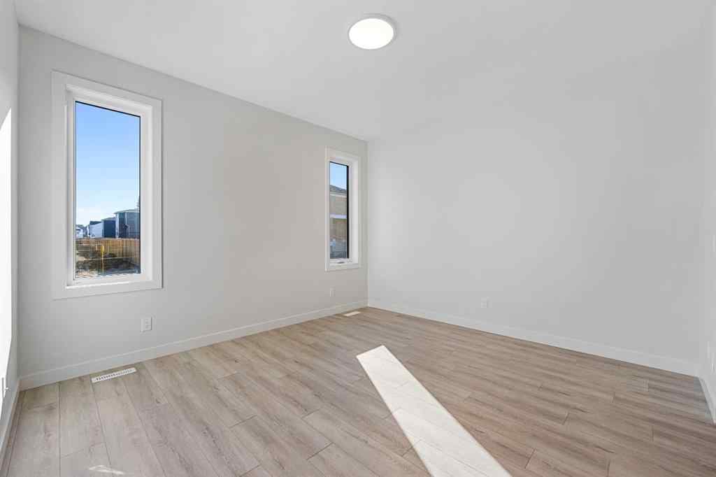 MLS® A2263359 - 125 Ambleton Boulevard NW in Moraine Calgary, Residential