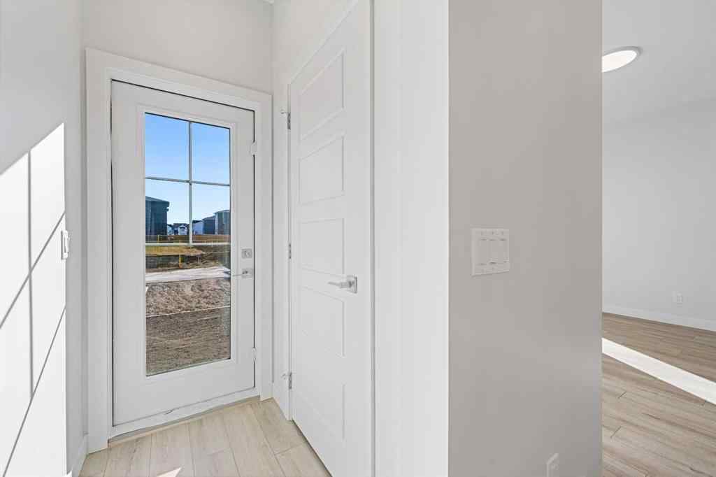 MLS® A2263359 - 125 Ambleton Boulevard NW in Moraine Calgary, Residential