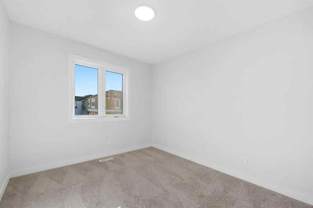 MLS® A2263359 - 125 Ambleton Boulevard NW in Moraine Calgary, Residential