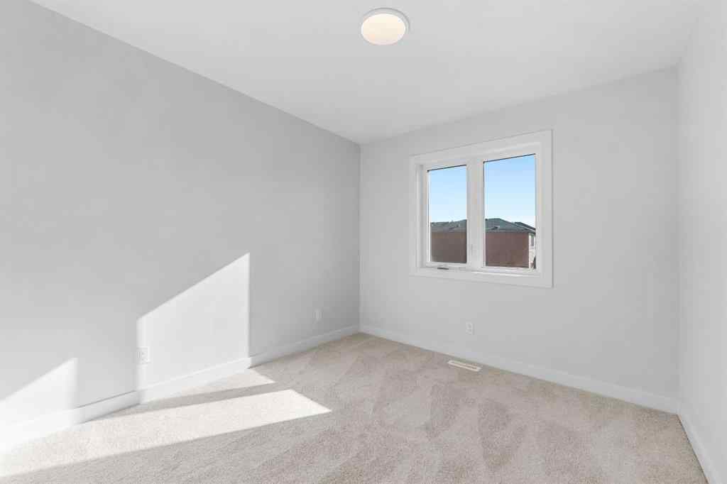 MLS® A2263359 - 125 Ambleton Boulevard NW in Moraine Calgary, Residential