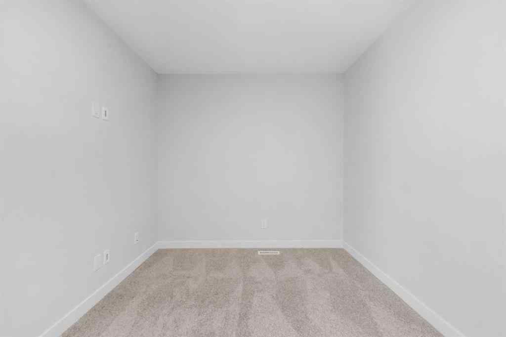 MLS® A2263359 - 125 Ambleton Boulevard NW in Moraine Calgary, Residential