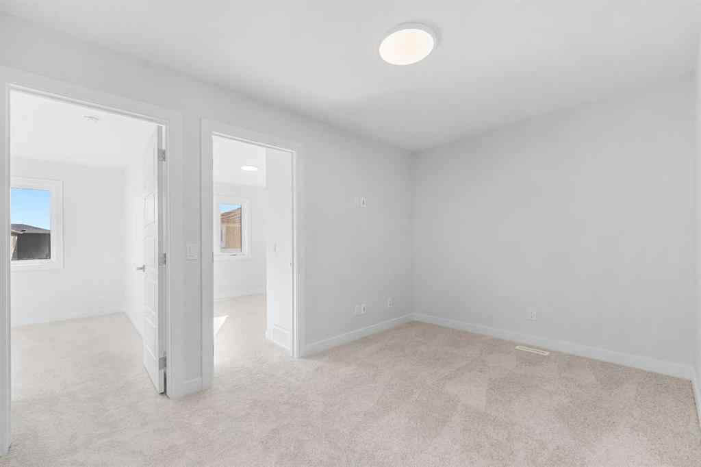 MLS® A2263359 - 125 Ambleton Boulevard NW in Moraine Calgary, Residential