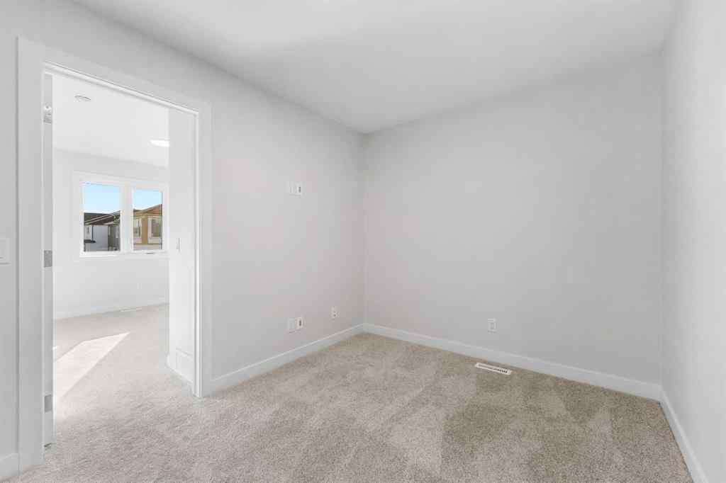 MLS® A2263359 - 125 Ambleton Boulevard NW in Moraine Calgary, Residential