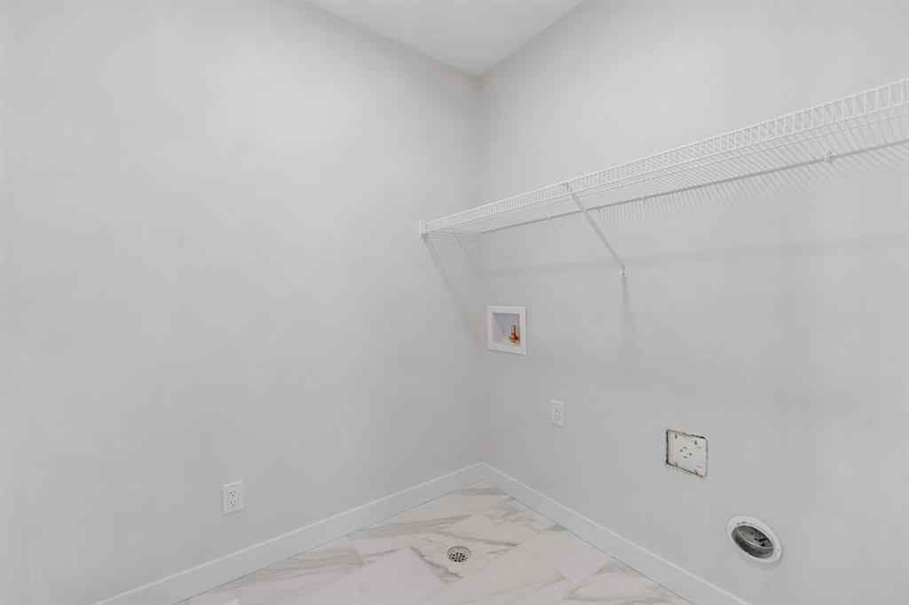 MLS® A2263359 - 125 Ambleton Boulevard NW in Moraine Calgary, Residential