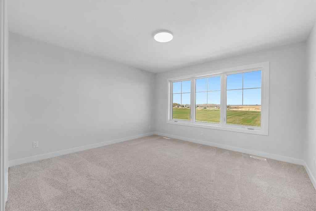 MLS® A2263359 - 125 Ambleton Boulevard NW in Moraine Calgary, Residential