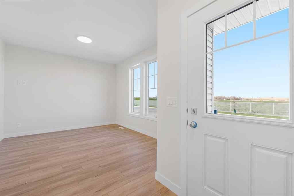 MLS® A2263359 - 125 Ambleton Boulevard NW in Moraine Calgary, Residential