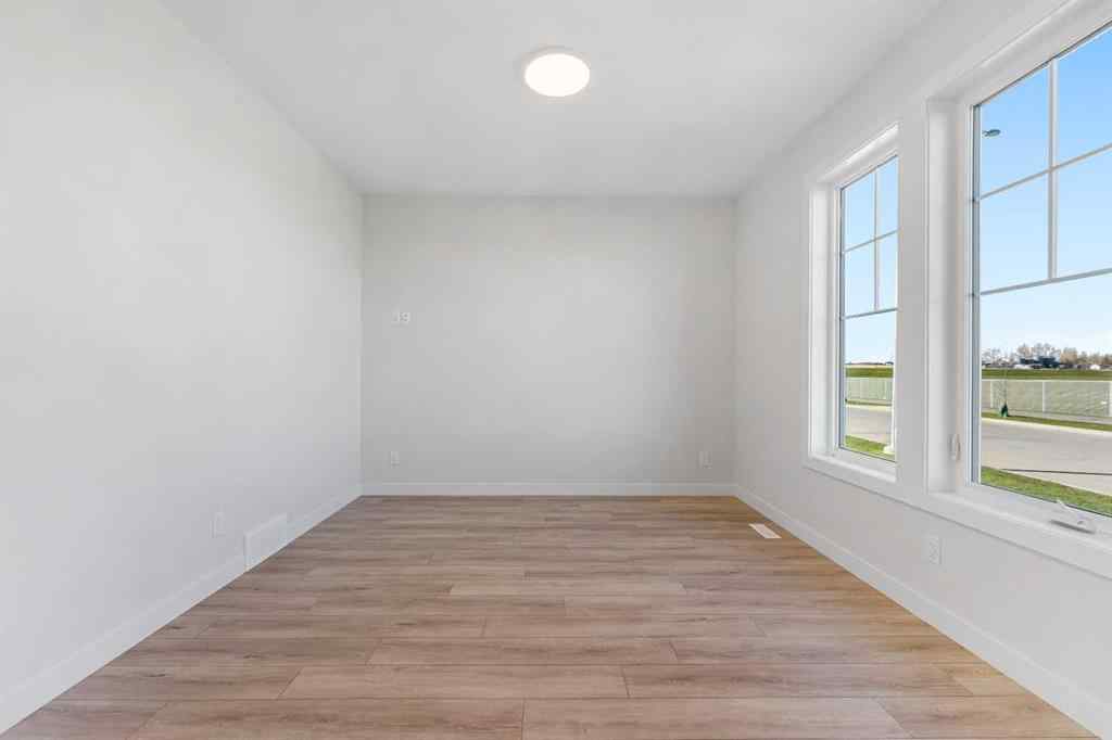 MLS® A2263359 - 125 Ambleton Boulevard NW in Moraine Calgary, Residential