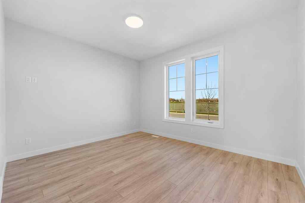 MLS® A2263359 - 125 Ambleton Boulevard NW in Moraine Calgary, Residential