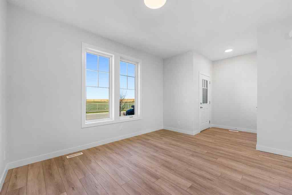 MLS® A2263359 - 125 Ambleton Boulevard NW in Moraine Calgary, Residential